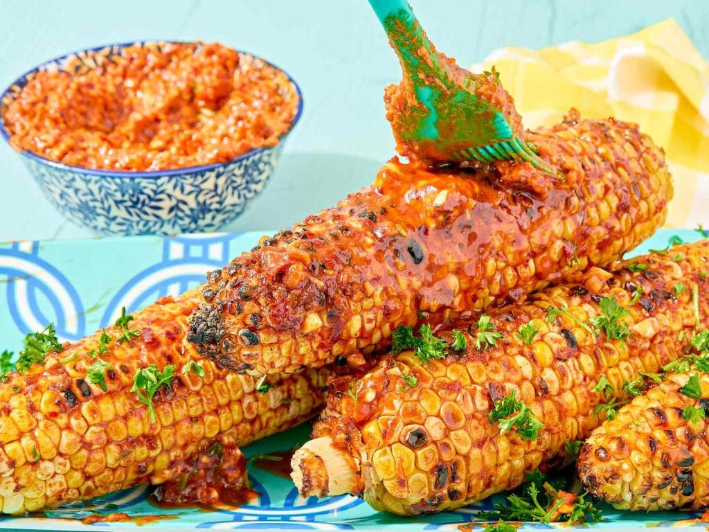 20250626-SEA-SmokedPaprikaHarissaButterGrilledCornontheCob-NiedleCreative-HERO-4a3e614d0dbb41a6aa2f3.jpeg