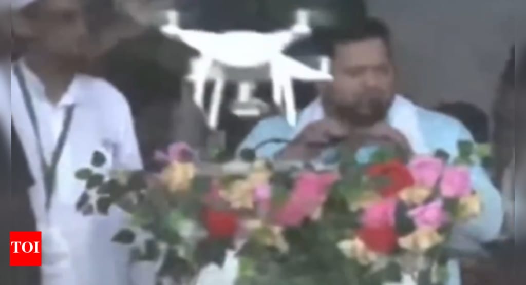 Watch: Drone crashes into Tejashwi Yadav’s podium during Patna rally; leader ducks just in time | India News - Times of India
