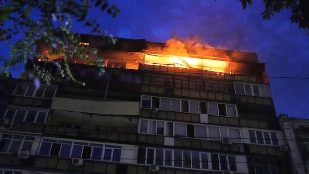 a-fire-at-top-of-kyiv-residential-building-following-a-russian-attack.jpg